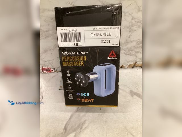Lot 49-5551989 - Reebok Aromatherapy Percussion Massager, Used without charger, has attachments, needs charge