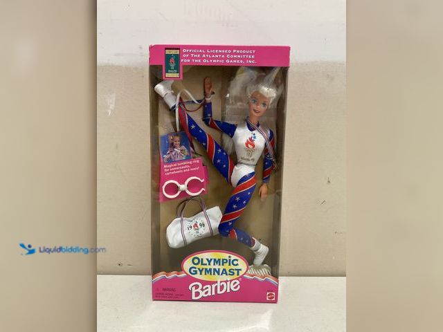 Lot 49-2009093 - Other WOW AN AMAZING NEW IN BOX 1996 OLYMPIC GYMNAST BARBIE WITH MAGICAL TUMBLING RING FOR CARTWHEEL...
