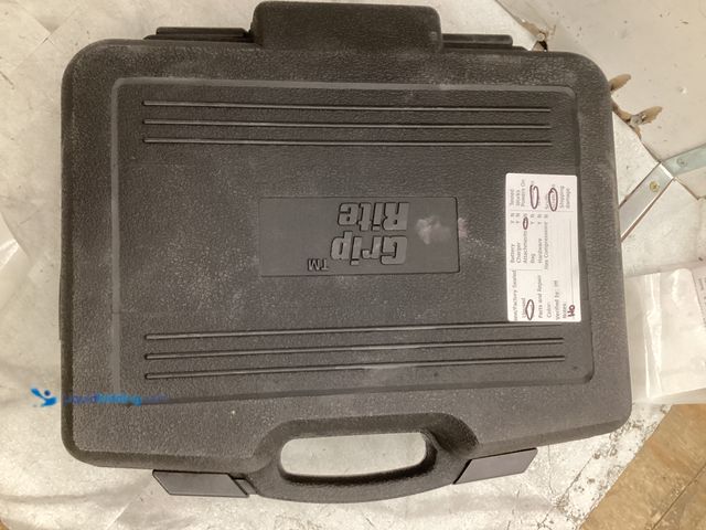 Lot 49-5551618 - Grip Rip Nailer Tool, Used with attachments, scuffs, case included.