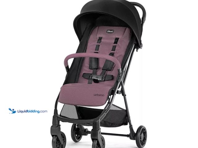 Lot 49-5552908 - Chicco Urbino Compact Lightweight Stroller - Jam. UPC: 049796614541. Unused with attachments.