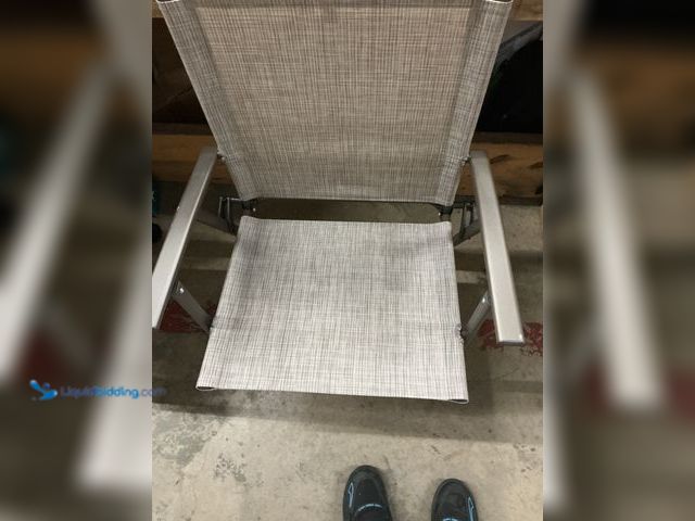 Lot 49-5549742 - outdoor folding lawn chair, khaki, 19"wide seat, 16" deep seat, 24" tall back. Unused