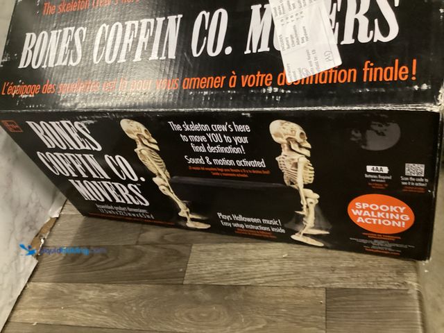 Lot 49-5436806 - Animatronics Bones Coffin Co Movers sound & motion activated walks & plays music. Unused.