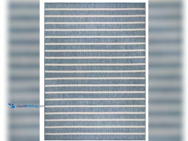 Lot 49-3615791 - Nourison Positano Navy Ivory 9 ft. x 12 ft. Stripes Contemporary Area Rug, Model # 903730, Unused. (...