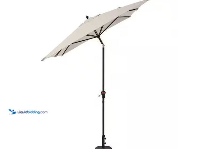 Lot 49-5555282 - Hampton Bay
6.5 ft. x 10 ft. Aluminum Market Auto-Tilt Patio Umbrella in Putty Beige, Used