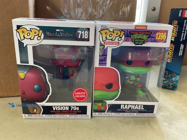 Lot 49-5515543 - Other LOT OF 2 FUNKO POPS IN ORIGINAL BOXES INCLUDING VISION 70’S #718 AND RAPHAEL #1396