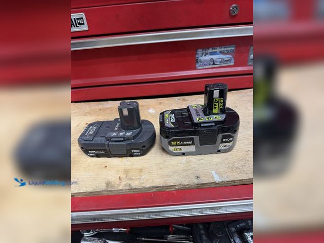 Lot 49-1910256 - Batteries and charger.All working perfectly