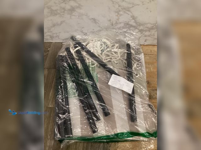 Lot 49-5415155 - Outdoor hammock. Slightly used. Hardware needed.