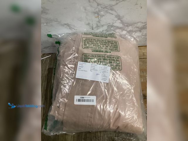 Lot 49-5415164 - Beige/tan replacement gazebo/patio bug screen curtain. Unused.