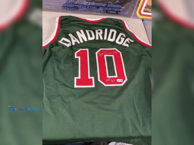 Lot 49-1505746 - COLLECTIBLE BOB DANDRIDGE MILWAUKEE BUCKS AUTOGRAPHED STITCHED BASKETBALL JERSEY WITH BECKETT WITNES...