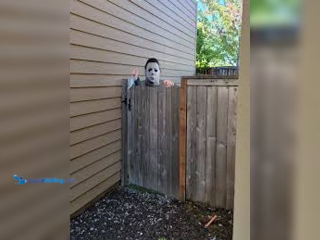 Lot 49-5559205 - Michael Myers Fence Creeper Halloween 2 II Halloween Movie Decoration, Model# 191245293903, Unused