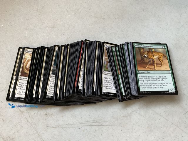 Lot 49-1830510 - COLLECTIBLE AWESOME STACK OF 100+ MAGIC THE GATHERING COLLECTIBLE TRADING CARDS VARIOUS YEARS AND TY...