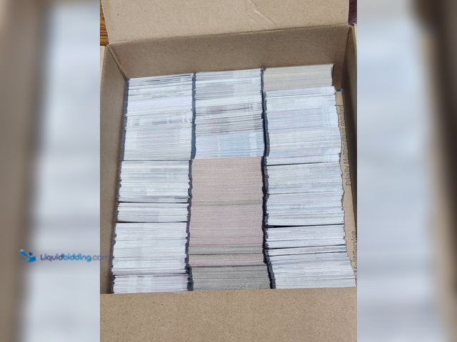 Lot 49-1988923 - BOX OF AROUND 2,000 COLLECTIBLE SPORTS CARDS.