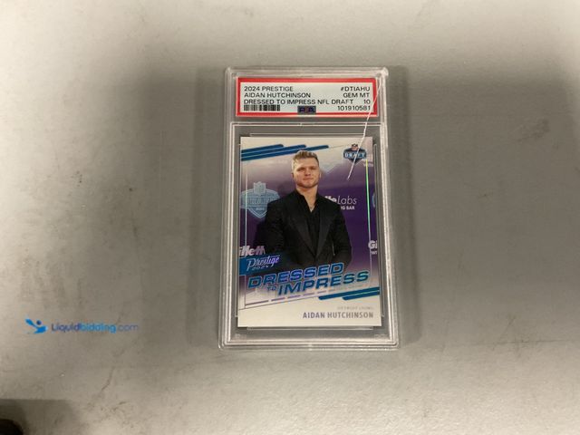 Lot 49-1811378 - COLLECTIBLE GRADED CARD! 2024 PRESTIGE AIDAN HUTCHINSON DRESSED TO IMPRESS INSERT PSA 10 GEM MT