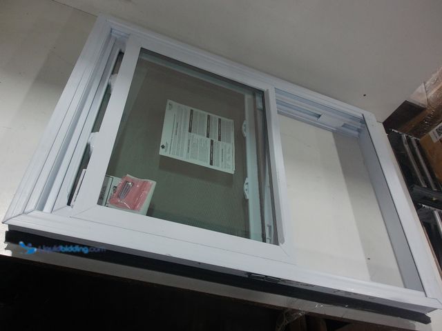 Lot 49-2021893 - American Craftsman Double hung vinyl dual glazed low-E argon fill foam insulation window white 41 1/...