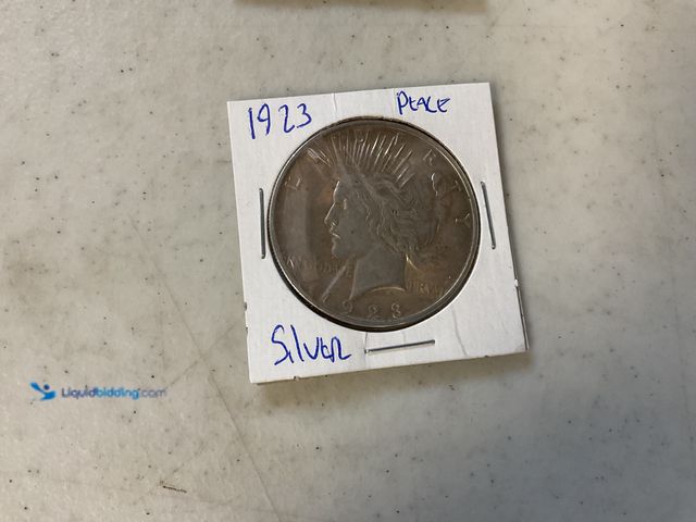 Lot 49-1811313 - 1923 PEACE SILVER DOLLAR COIN 90% SILVER