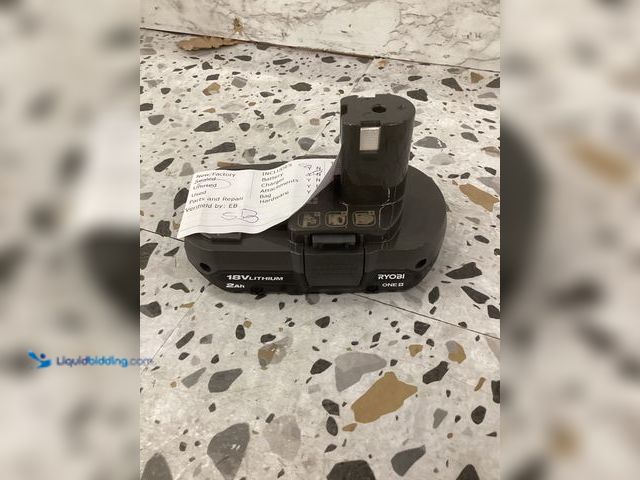 Lot 49-5452240 - Ryobi 18V Lithium Ion Battery Rechargable. Item is unused.