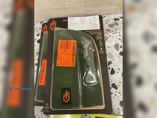 Lot 49-3539940 - Gerber E.A.B Poacket Knife. (Green) With a green beanie. New