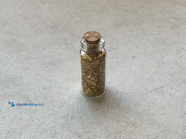 Lot 49-5515523 - RARE ONE INCH GLASS VILE OF PURE 24K GOLD FLAKES