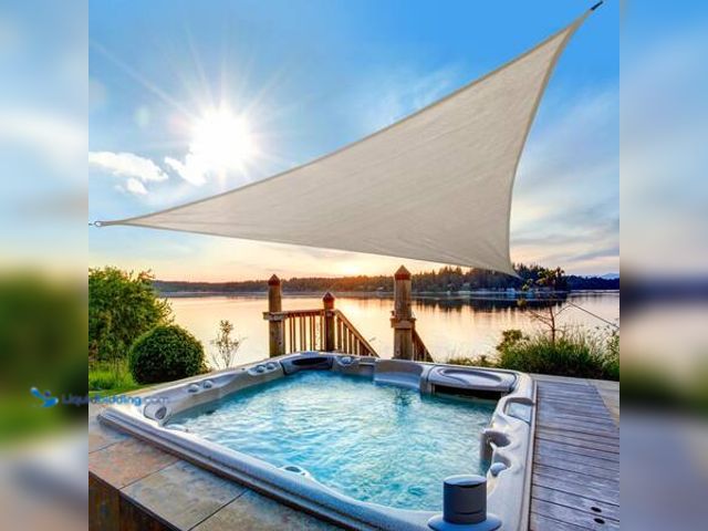 Lot 49-5554079 - Vigoro 12 ft. x 12 ft.  Triangle Shade Sail Color Almond Model # 25685 Unused