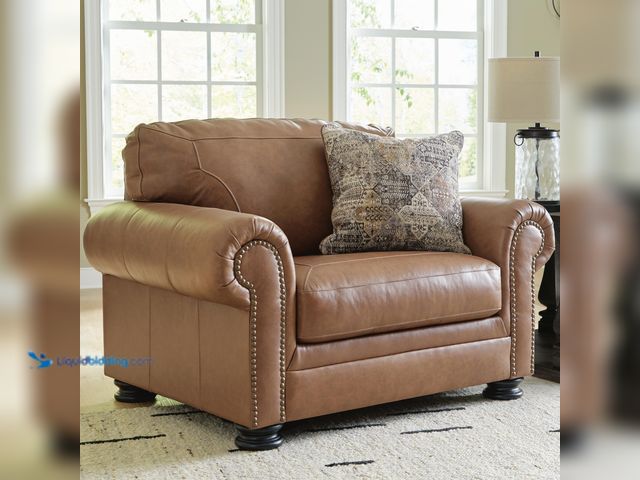 Lot 49-1636819 - Signature Design by Ashley Carianna Brown Leather Match Oversized Sofa Chair Extra Wide with Removab...