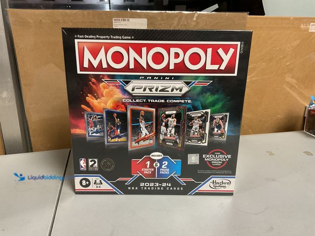 Lot 49-1505923 - FACTORY SEALED 2023-24 PANINI PRIZM MONOPOLY BOARD GAME INCLUDES 1 STARTER PACK AND 2 PRIZMS PACKS A...