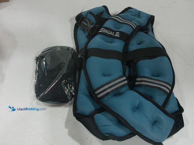 Lot 49-2026402 - weighted vest bagail with separate attachment. Unused.