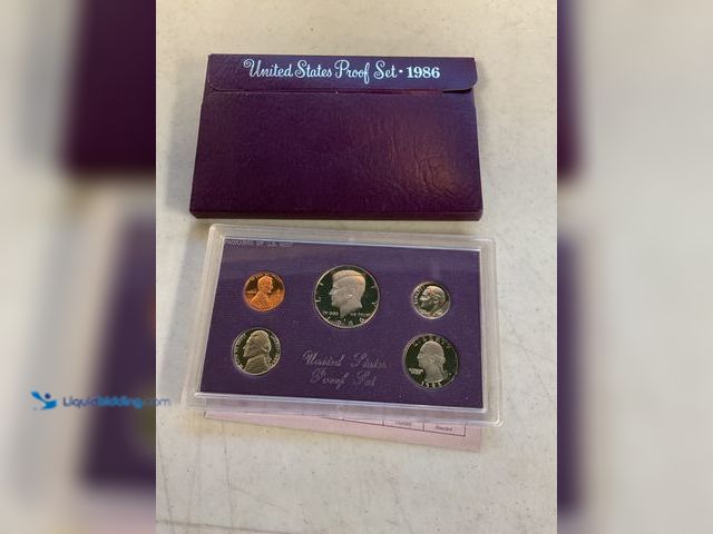 Lot 49-1804578 - 1986 US PROOF SET 5 COINS IN HARD PLASTIC CASE.