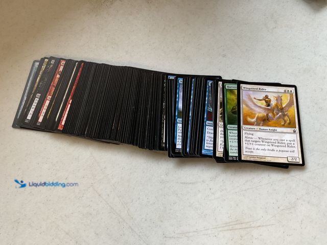 Lot 49-5341514 - AWESOME STACK OF 100+ MAGIC THE GATHERING CARDS FROM VARIOUS YEARS AND TYPES LOADED WITH GREAT CARDS...