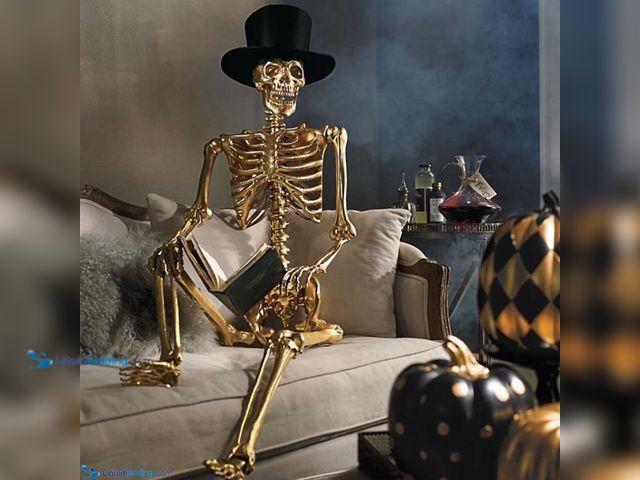 Lot 49-5440177 - Gold Life-size Poseable Skeleton (hat not included). Unused