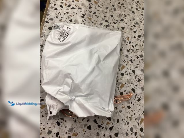 Lot 49-5452122 - Copper Plated Hangers PK of 2. Item is unused.