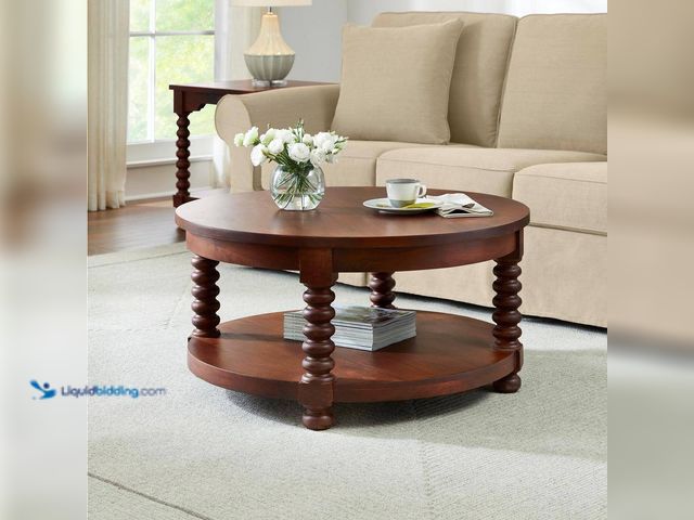 Lot 49-5552685 - Home Decorators Collection
Glenmore Medium Walnut Brown Round Wood Coffee Table with Detailed Legs....