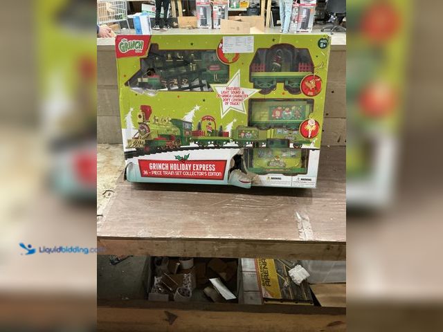 Lot 49-3529100 - Dr Seuss The Grinch Holiday Express 36 Pc Train Set Collector's Edition (attachments included) Used