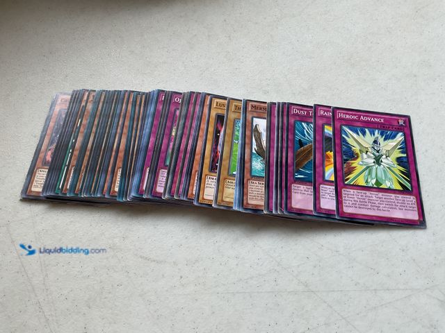 Lot 49-1804509 - 100+ YU-GI-OH COLLECTIBLE CARDS.