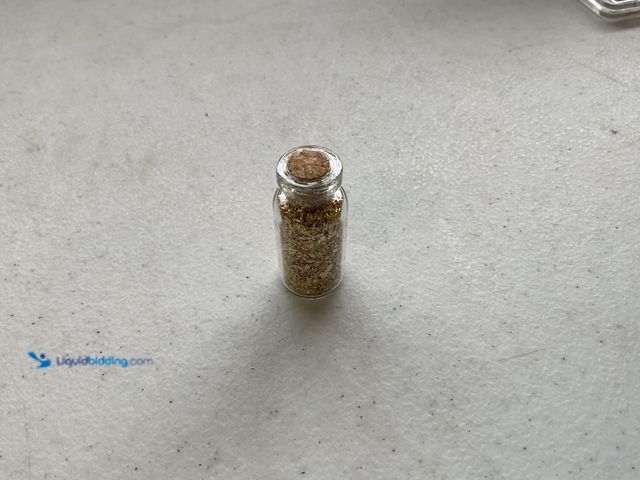 Lot 49-5341823 - RARE ONE INCH GLASS VILE OF PURE 24K GOLD FLAKES