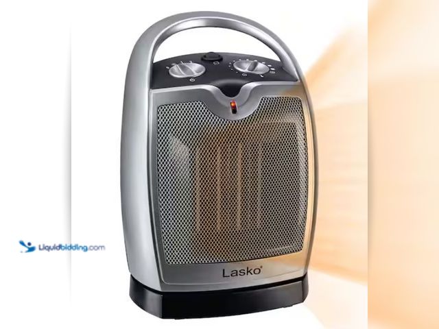 Lot 49-1515944 - Lasko Compact 11.25 in. 1500-Watt Electric Ceramic Portable Oscillating Space Heater, Model # 5409, ...