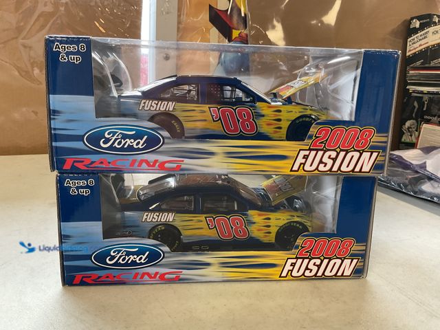 Lot 49-1830643 - COLLECTIBLE LOT OF 2 FORD RACING 2008 FUSION 1/24 SCALE DIECAST CARS IN ORIGINAL BOXES #COINS0219