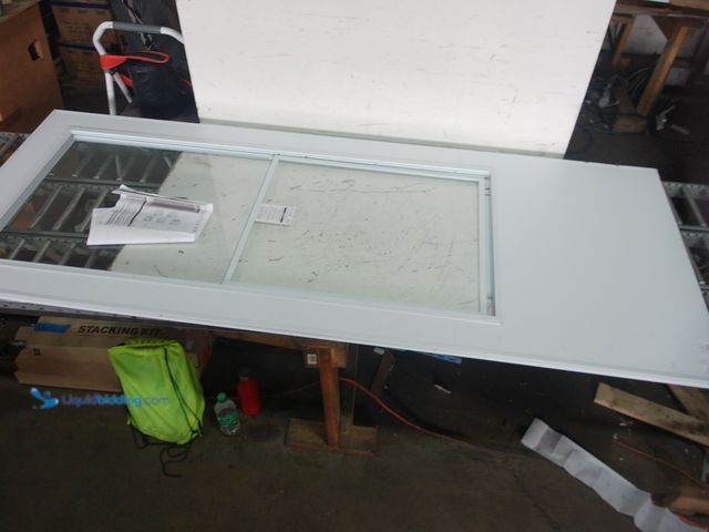 Lot 49-1625699 - 79 x  31 1/4" White Storm door, Slightly used, No attachments, Scuff/scratches, Shipping damage. (NO...