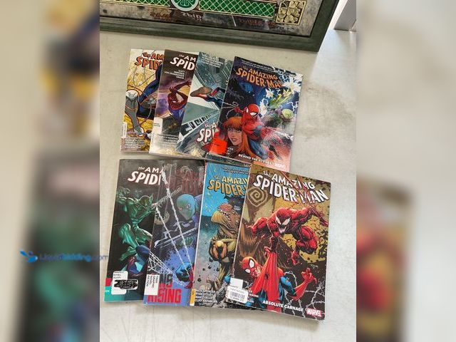 Lot 49-1830484 - COLLECTIBLE LOT OF 8 TRADE PAPERBACK SPIDER-MAN BOOKS ALL PRE-OWNED CONDITION. GREAT LOT FOR ANY COL...