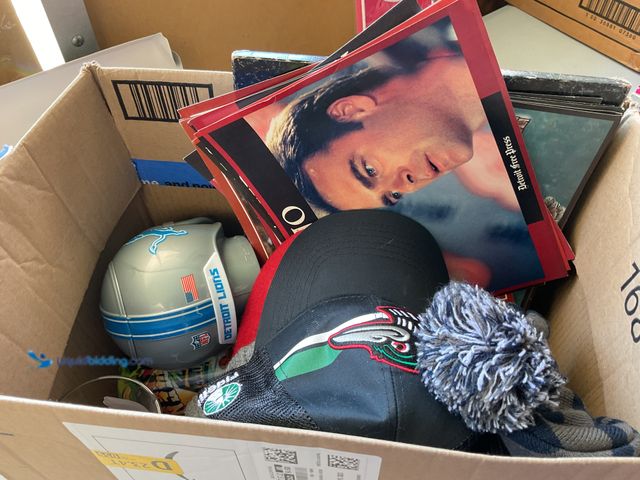 Lot 49-1971424 - Other LARGE BOX FULL OF SPORTS COLLECTIBLES AND MEMORABILIA INCLUDING TRAVEL CUPS, HATS, PRINTS, TOY...