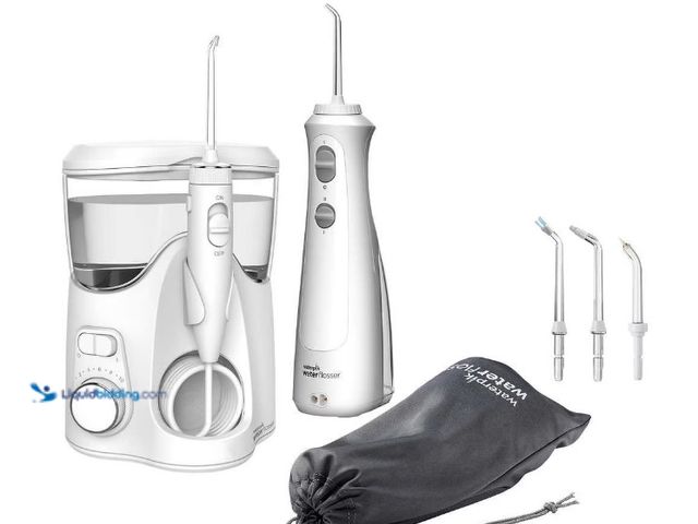 Lot 49-5538953 - Waterpik Ultra Plus and Cordless Pearl Water Flosser Combo Pack. Unused with attachments. Unable to ...