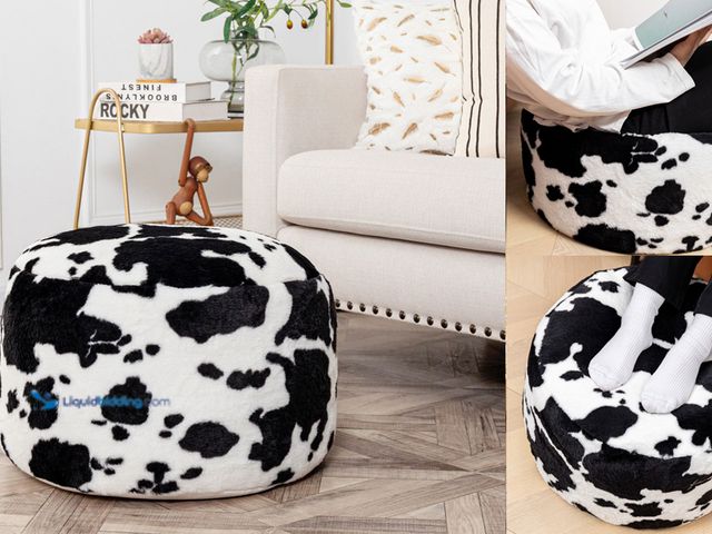 Lot 49-5547934 - Round Cow Print Ottoman. Black and White. Unused
