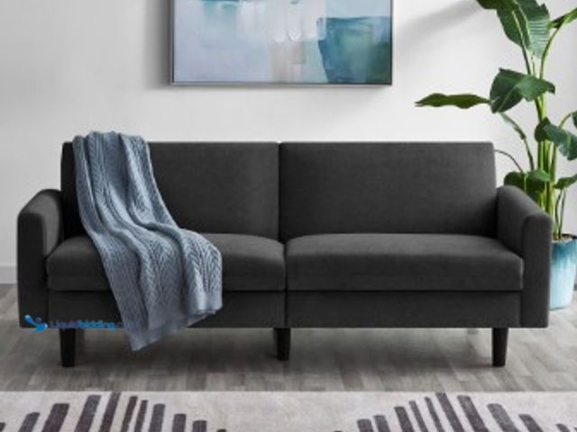 Lot 49-2025636 - Mainstays 73 in Storage Futon, Charcoal, Model # 15734716489, MSRP $198, Slightly used, Slightly dir...