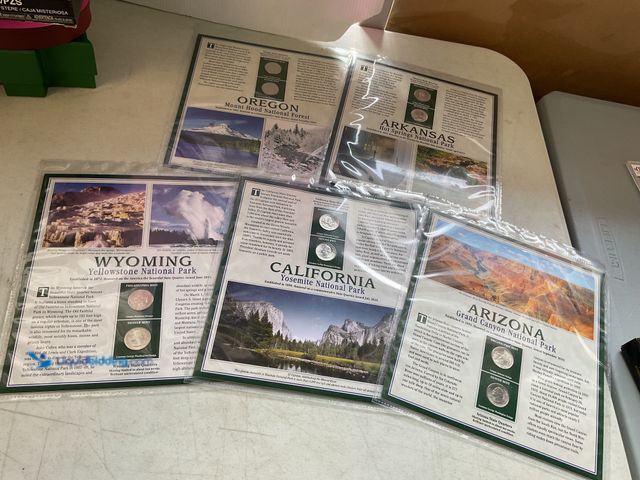 Lot 49-1505058 - 5 STATEHOOD QUARTER AND STAMP SETS INCLUDING OREGON, ARKANSAS, WYOMING, CALIFORNIA, AND ARIZONA.