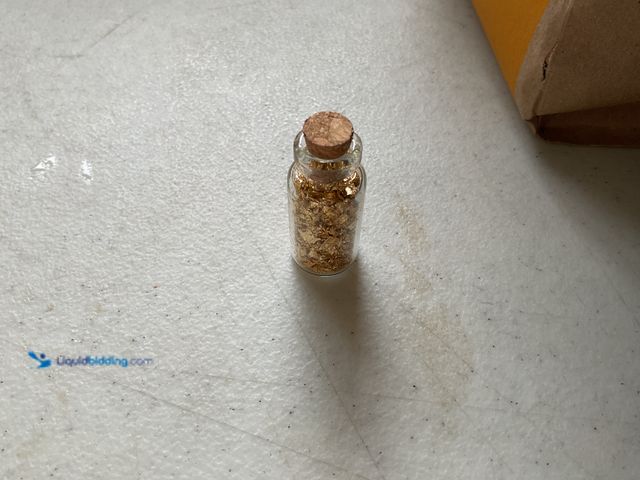 Lot 49-3503726 - RARE ONE INCH GLASS VILE OF PURE 24K GOLD FLAKES