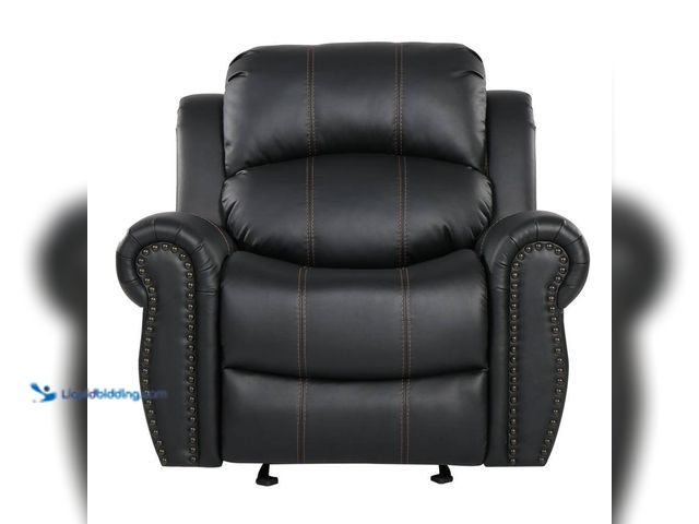Lot 49-5463542 - Noble House
Gavin Black Faux Leather Glider Recliner with Nailhead Trim Unused