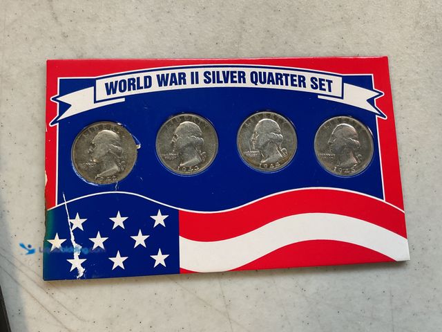 Lot 49-1810264 - WW II SILVER QUARTER SET 4 COINS IN A COLLECTOR DISPLAY
