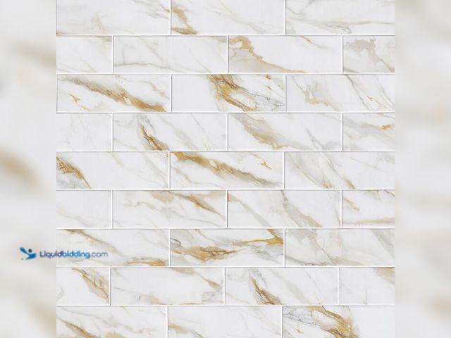Lot 49-2000734 - MSI Calcatta Gold Matte White and Gold Porcelain Marble Look Subway Tile 4 in. x 12 in., Floor and W...