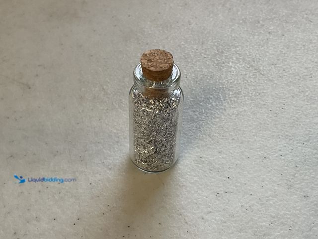 Lot 49-1505422 - RARE ONE INCH GLASS VILE OF PURE SILVER FLAKES #COINS0122