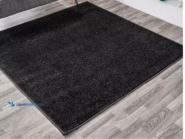 Lot 49-2026044 - JONATHAN Y Haze Solid Low-Pile Black 6' Square Area Rug, Model # SEU100I-6SQ. MSRP: $92.22.  Slightl...