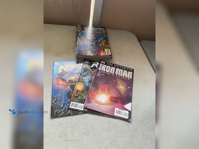 Lot 49-3609279 - Other LOT OF 20 COLLECTIBLE COMIC BOOKS FROM DC, MARVEL AND MORE INCUDING IRON MAN, ROBIN, AQUAMAN A...